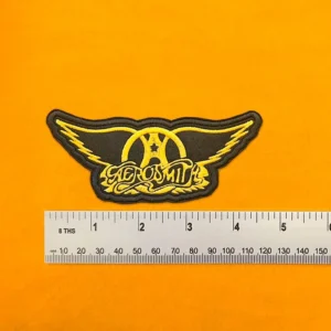 Aerosmith embroidered band patch beside measurement ruler