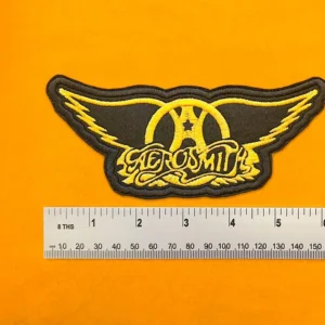 Embroidered band patch dimensions beside ruler