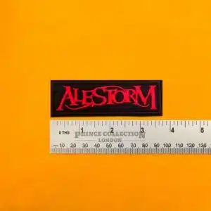 Embroidered Alestorm band design beside measurement ruler