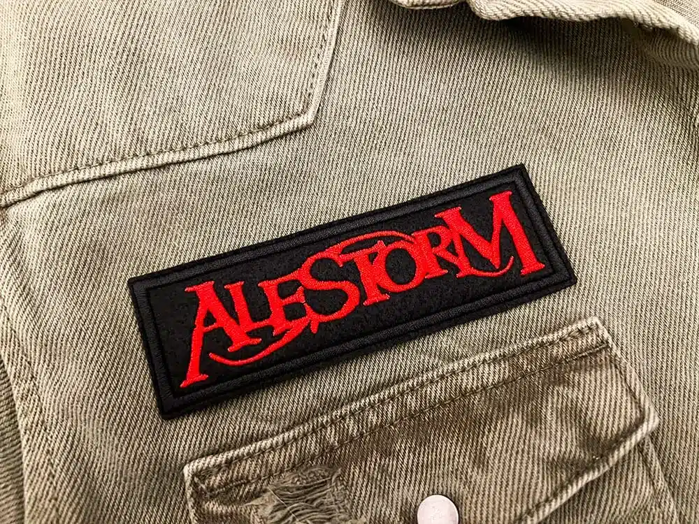 Embroidered metal patch border and stitching detail