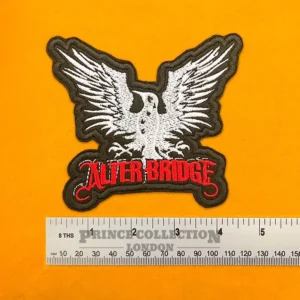 Embroidered band patch dimensions beside ruler