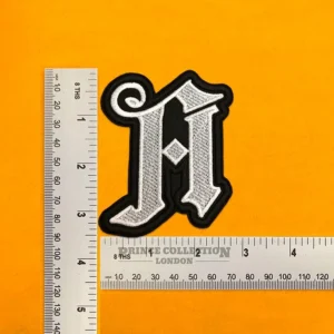 Architects band design beside measurement ruler