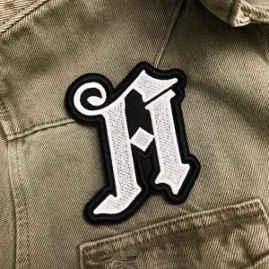 Embroidered metalcore patch border and stitching detail