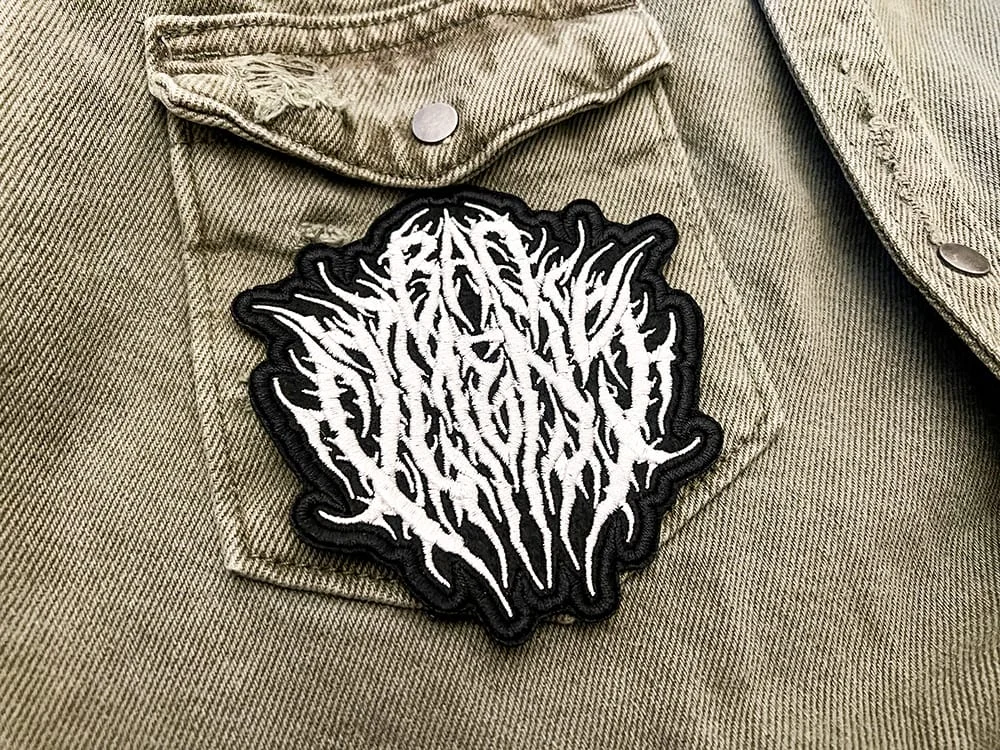 Embroidered metalcore patch border and stitching detail