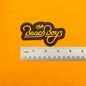 Beach Boys embroidered band patch beside measurement ruler