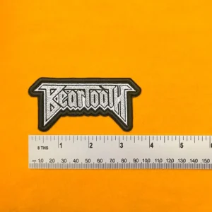Beartooth embroidered band patch beside measurement ruler