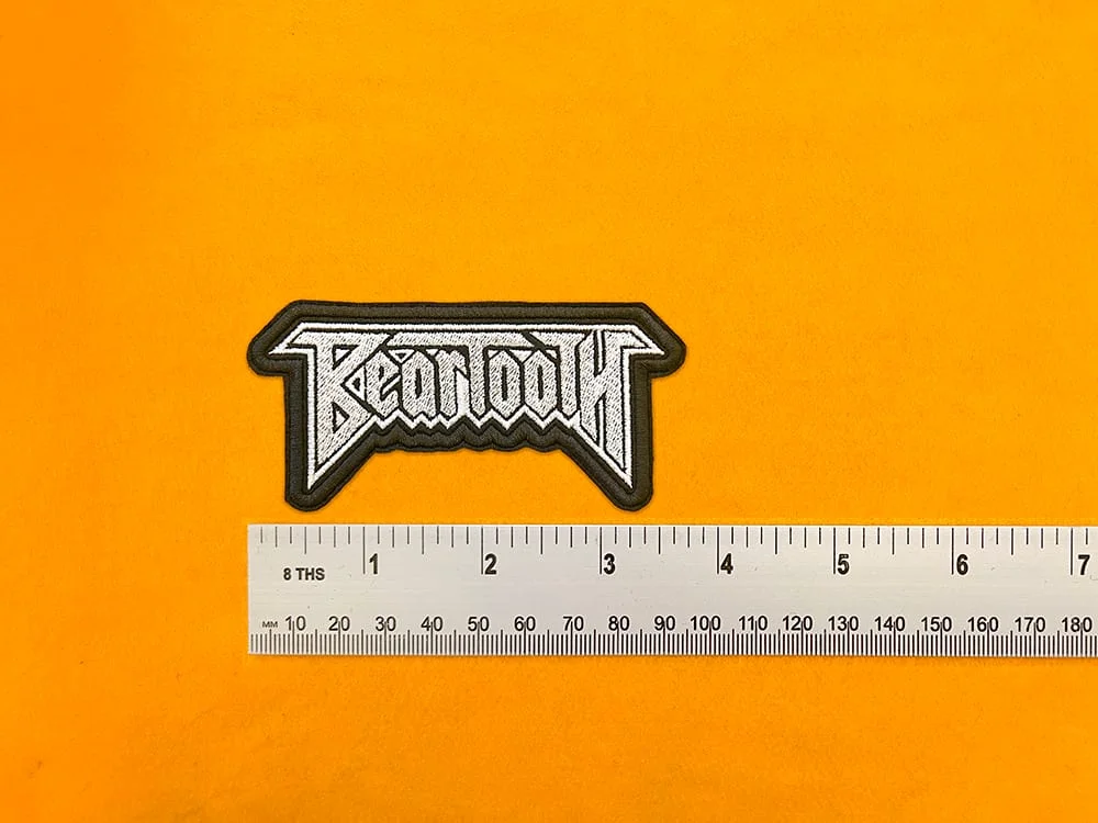 Beartooth embroidered band patch beside measurement ruler