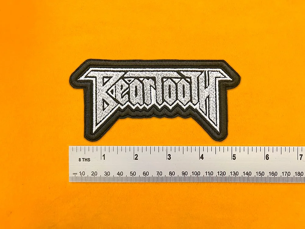 Embroidered band patch dimensions beside ruler