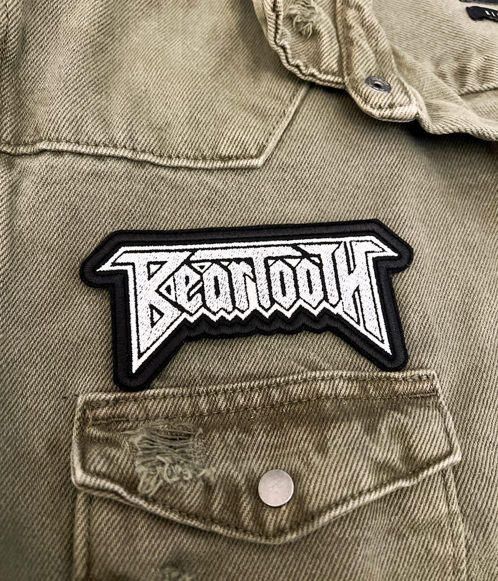 Close-up of embroidered border and stitching