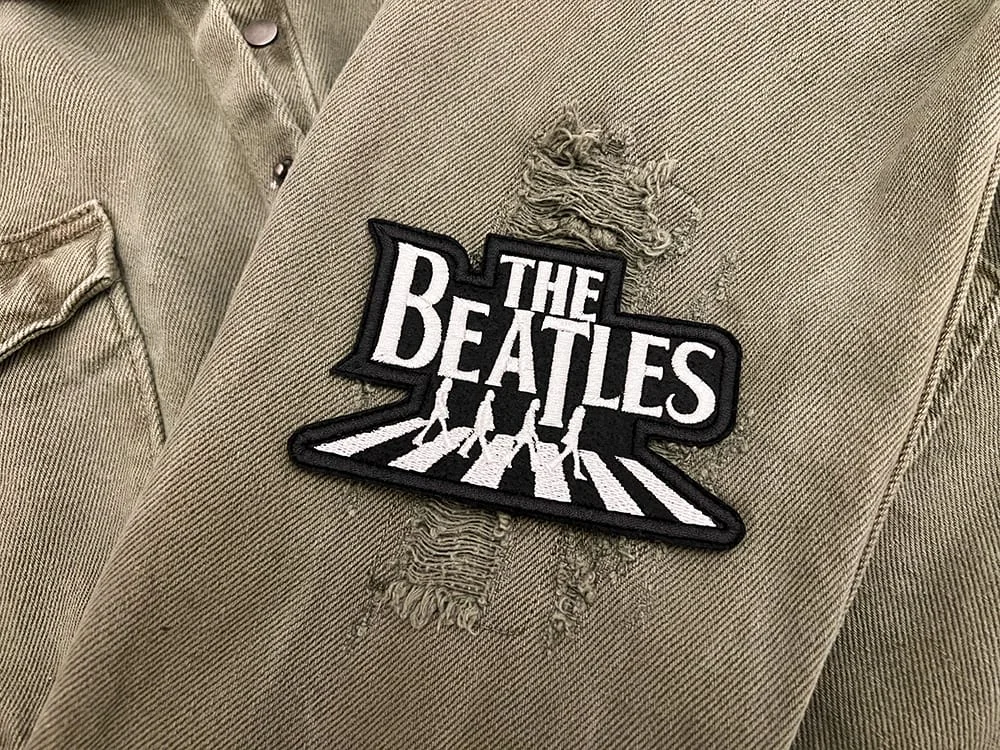 Embroidered Beatles band patch border and stitching detail
