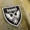 Embroidered metal patch border and stitching detail