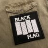 Embroidered punk patch border and stitching detail