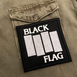 Embroidered punk patch border and stitching detail