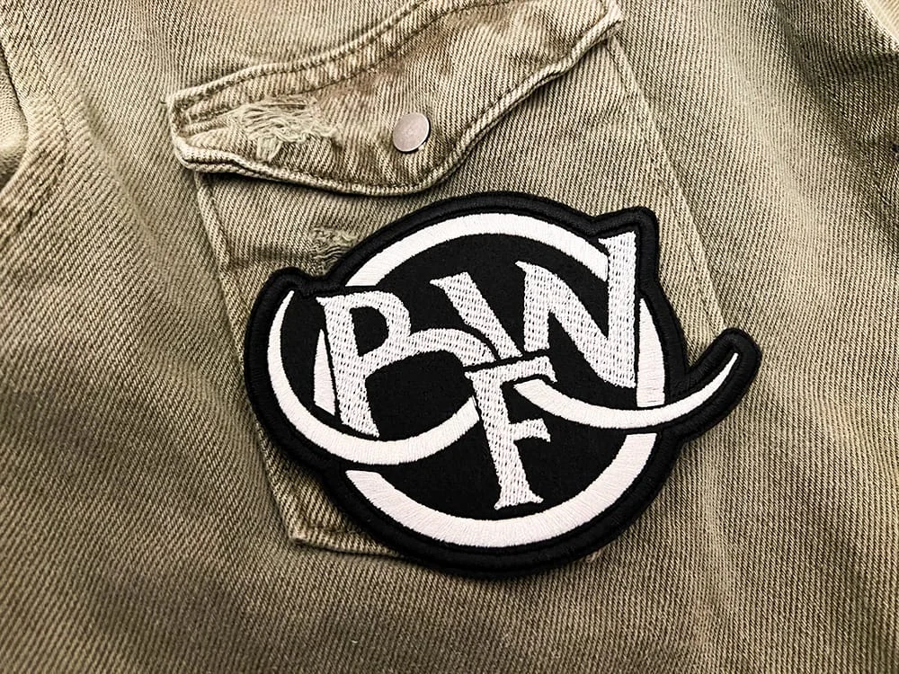 Embroidered metalcore patch border and stitching detail