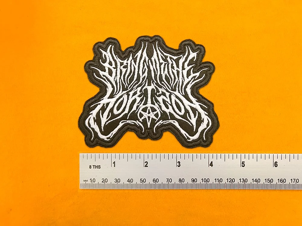 Embroidered band patch dimensions beside ruler