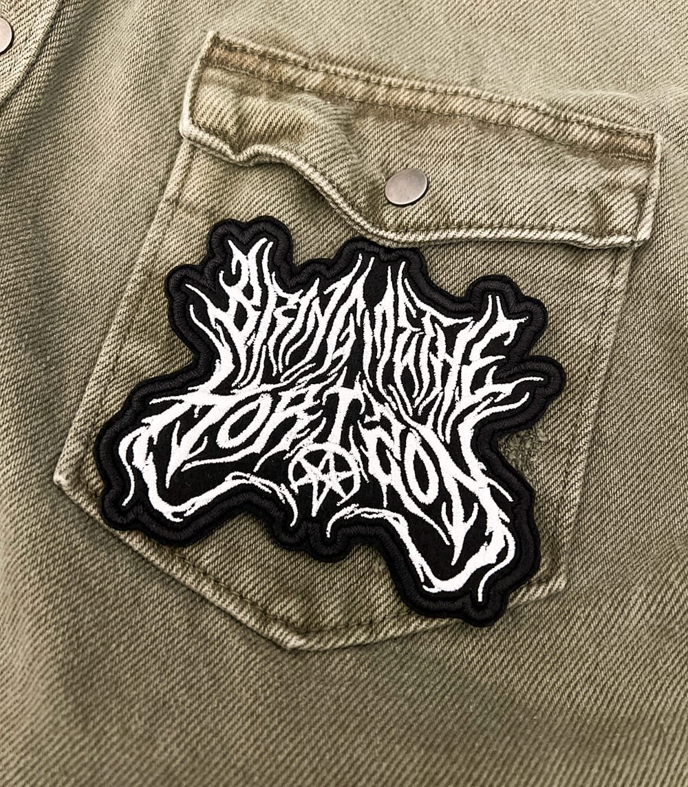 Close-up of embroidered border and stitching