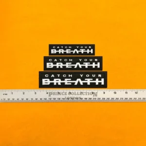 Embroidered logo beside measurement ruler