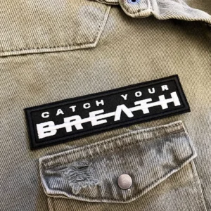 Catch Your Breath patch on denim jacket