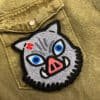 Embroidered anime patch border and stitching detail
