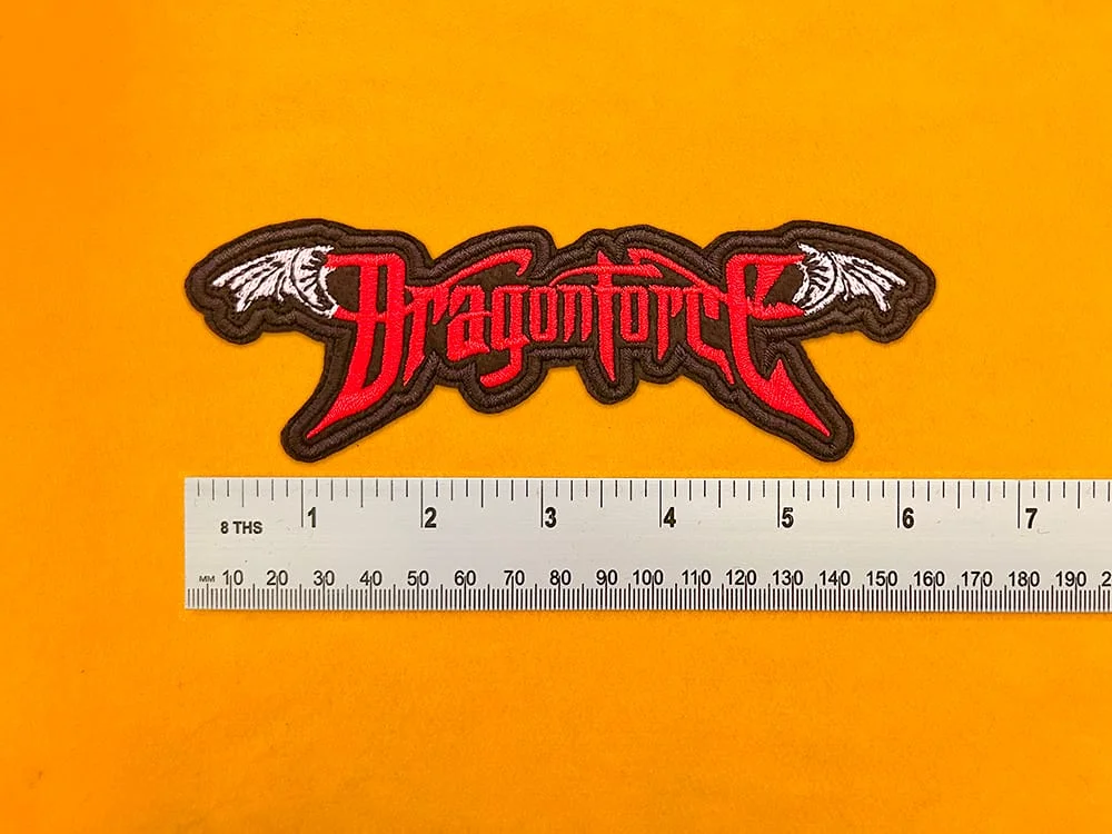 Embroidered band patch dimensions beside ruler