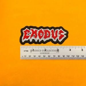 Embroidered Exodus band design beside measurement ruler