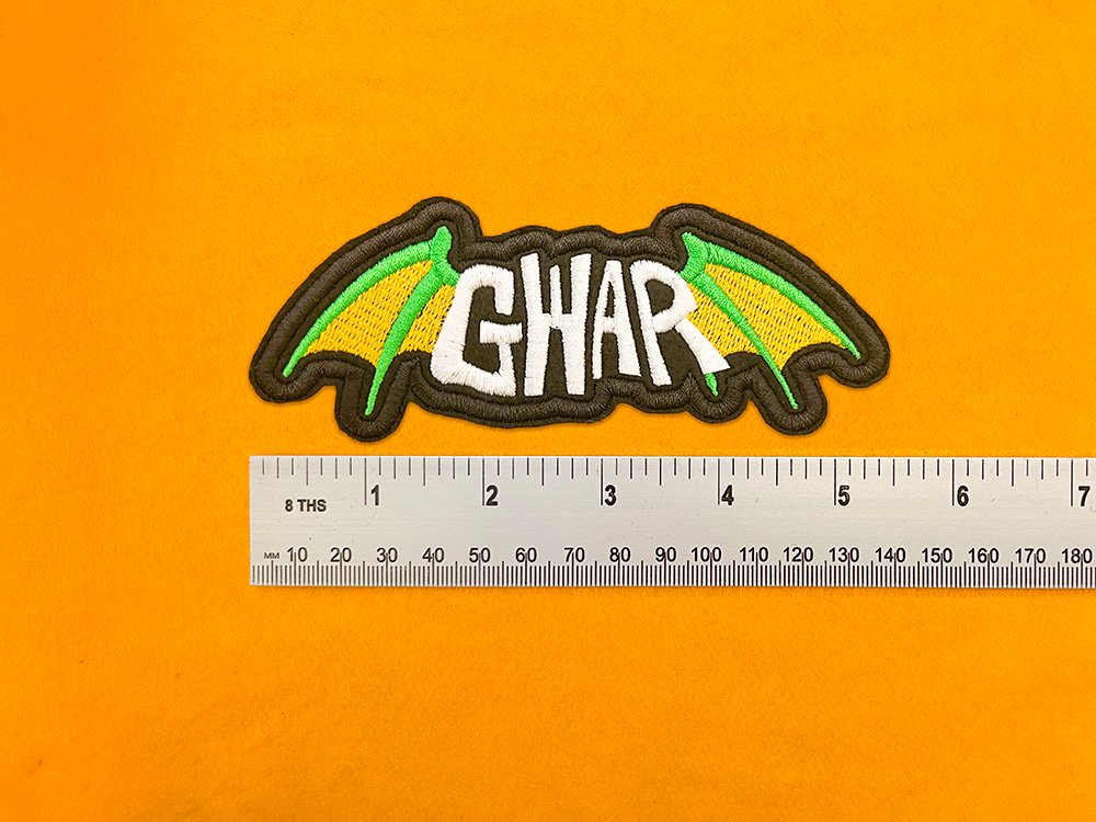 Embroidered patch dimensions beside ruler