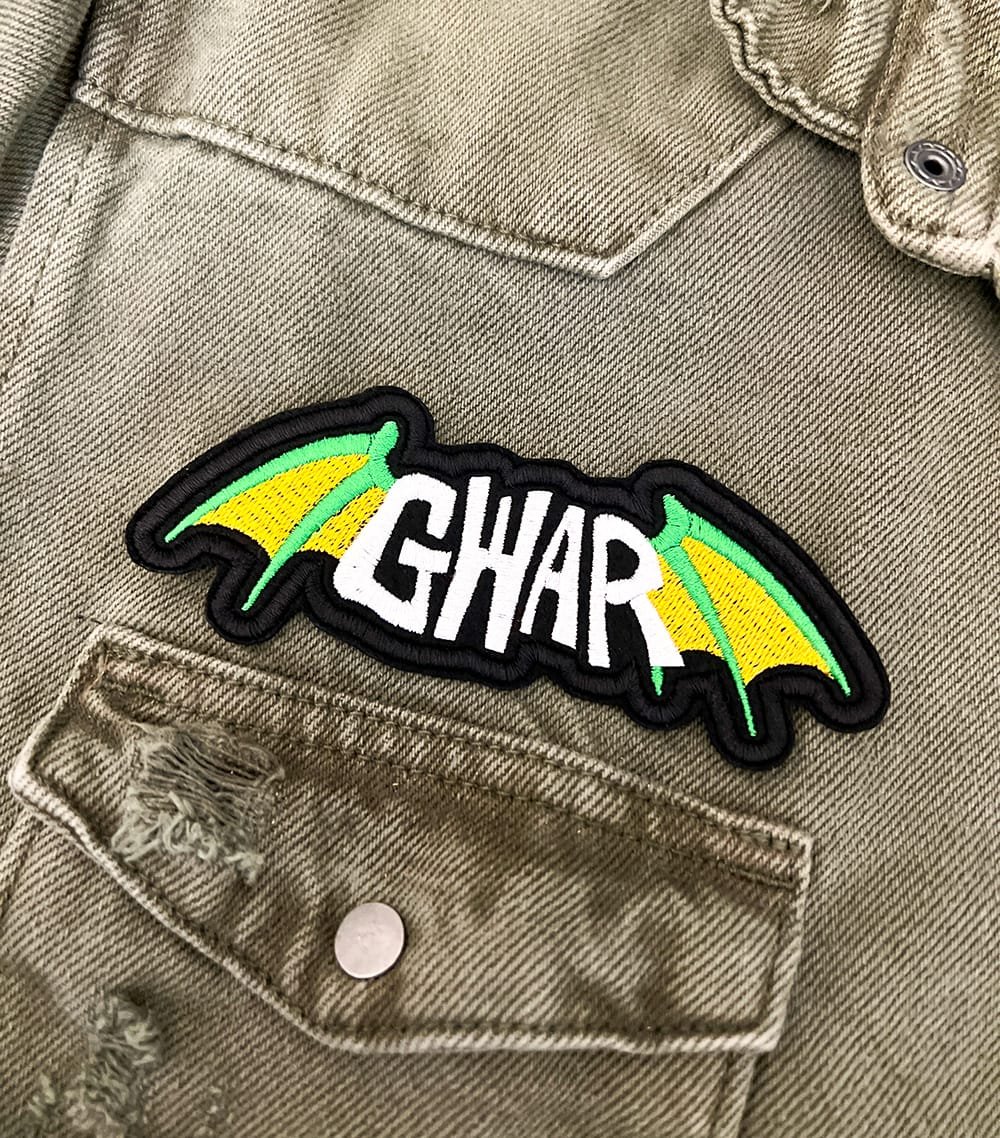 Close-up of embroidered border and stitching