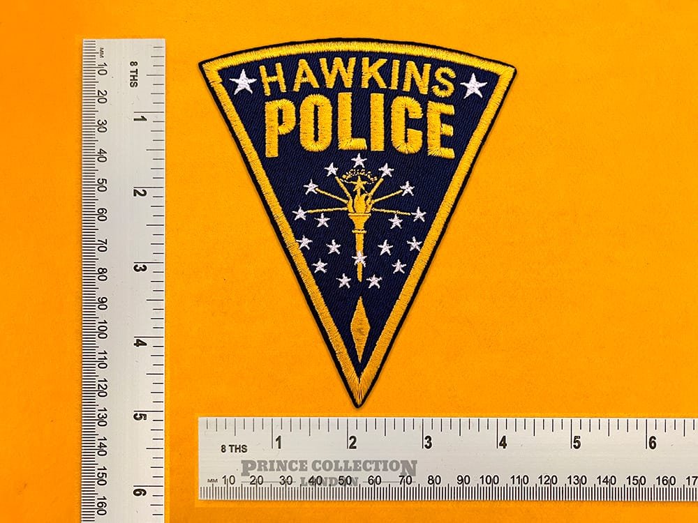 Small medium and large Hawkins Police patch size comparison