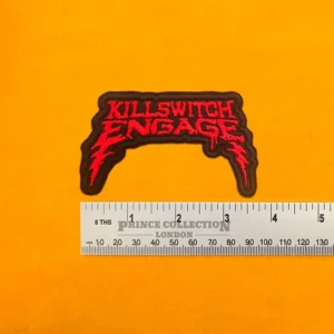 Embroidered Killswitch Engage design beside measurement ruler