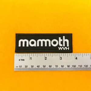 Mammoth embroidered band patch beside measurement ruler