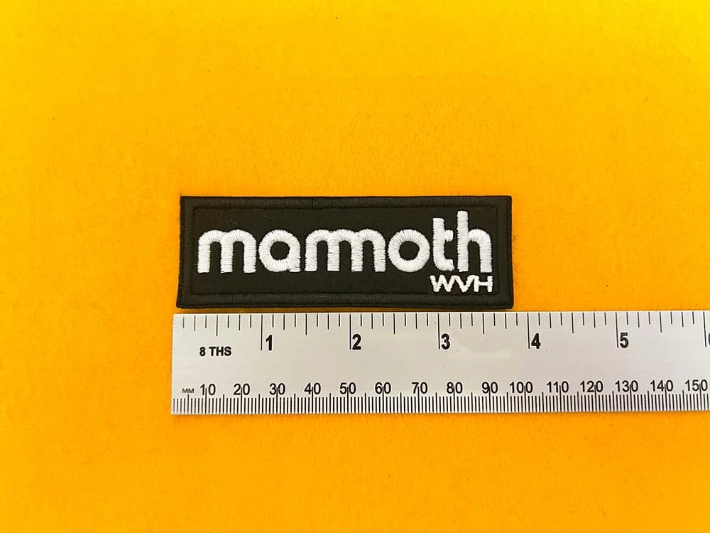 Mammoth embroidered band patch beside measurement ruler
