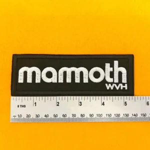 Embroidered Mammoth patch dimensions beside ruler