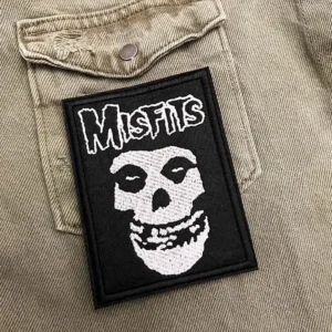 Embroidered punk patch border and stitching detail