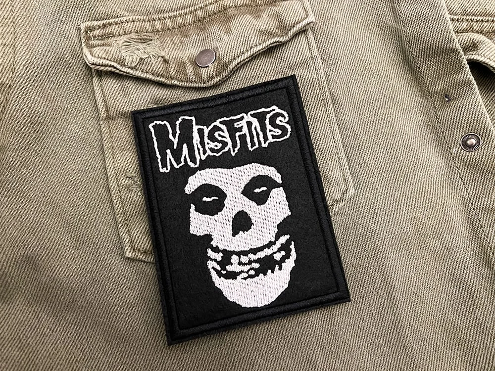 Embroidered punk patch border and stitching detail