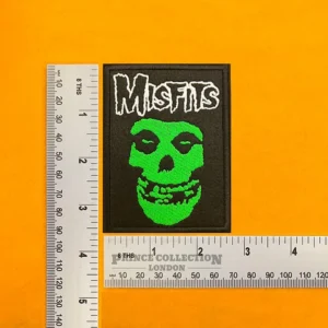 Embroidered Misfits band design beside measurement ruler