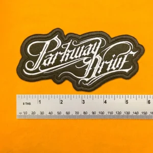 Embroidered band patch dimensions beside ruler
