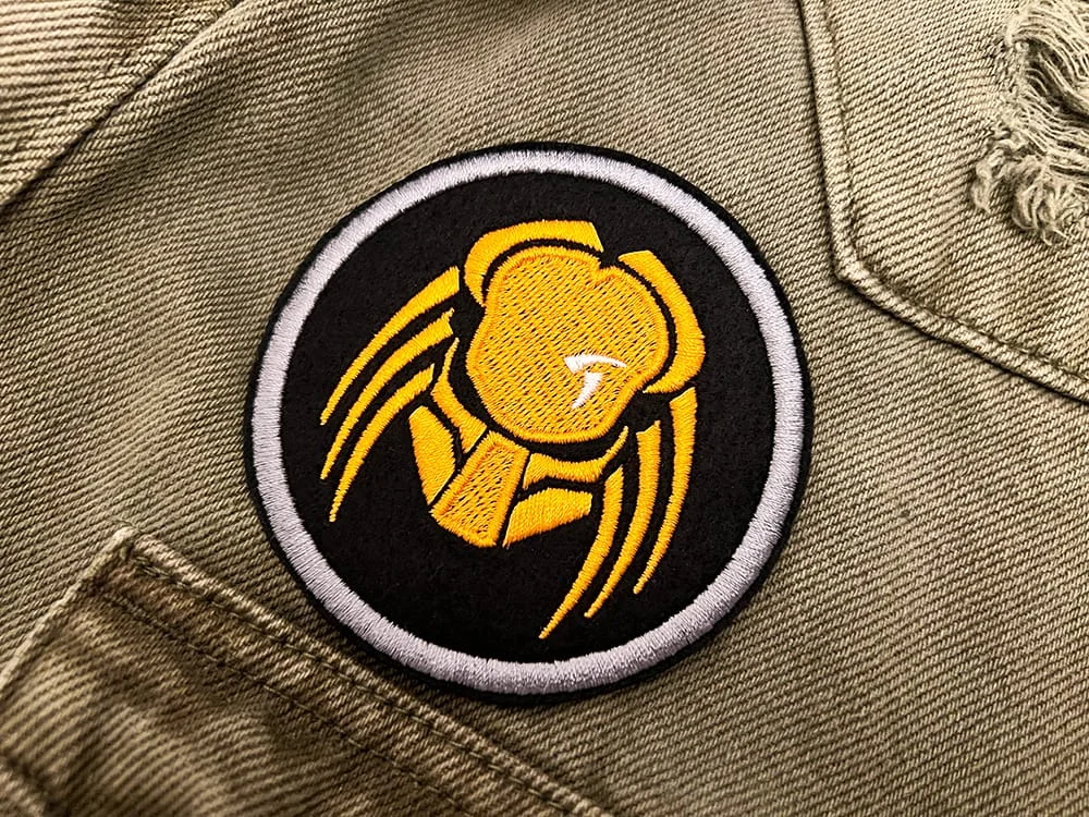 Embroidered sci-fi movie patch border and stitching detail