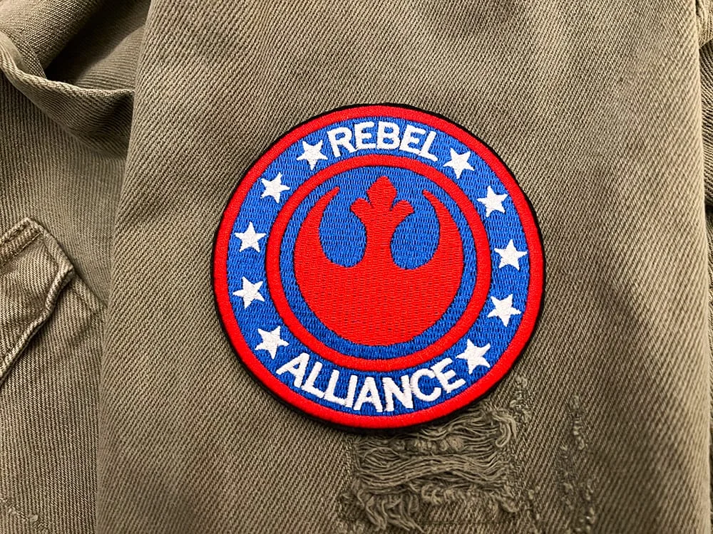Embroidered sci-fi symbol patch border and stitching detail
