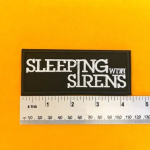 Embroidered band patch dimensions beside ruler