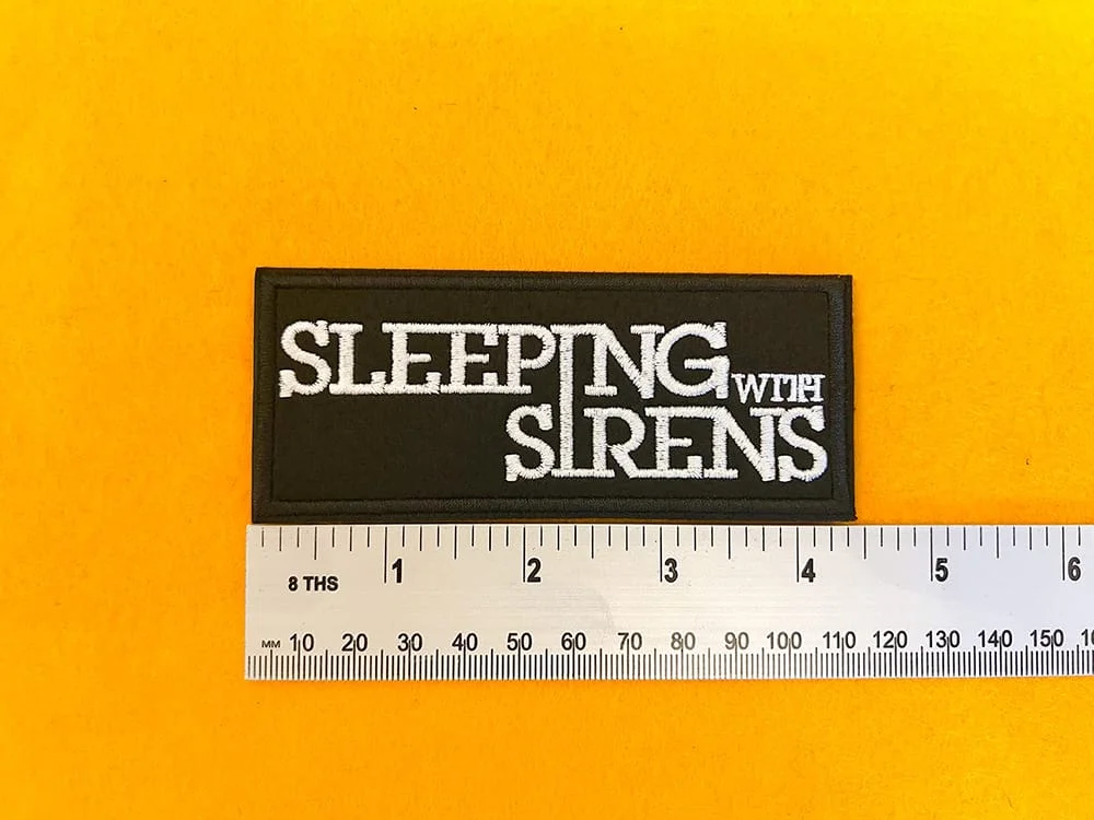 Embroidered band patch dimensions beside ruler