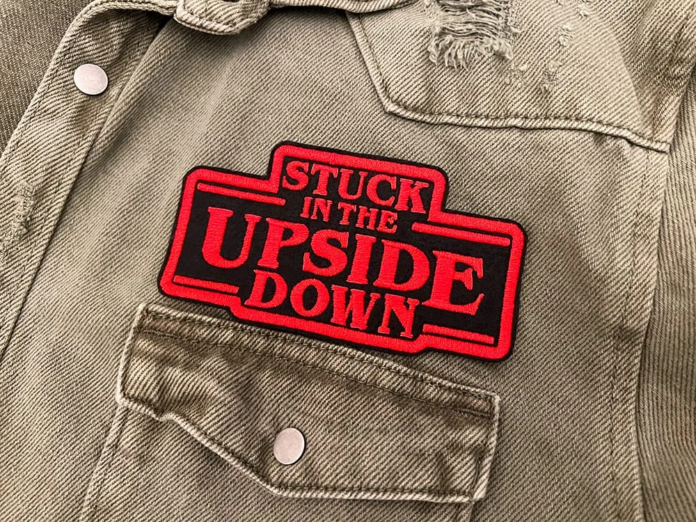 Embroidered Stranger Things patch border and stitching detail