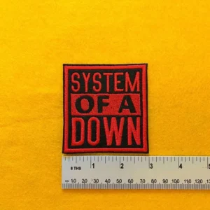System Of A Down embroidered band patch beside measurement ruler