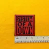 Small medium and large System Of A Down patch size comparison