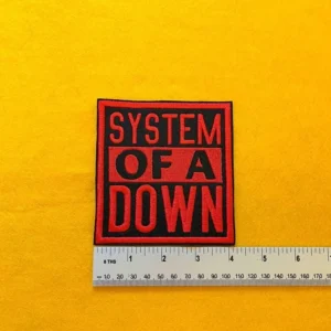 Embroidered System Of A Down patch dimensions beside ruler