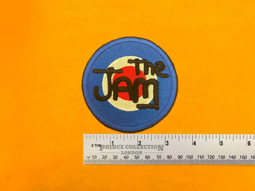 The Jam band design beside measurement ruler