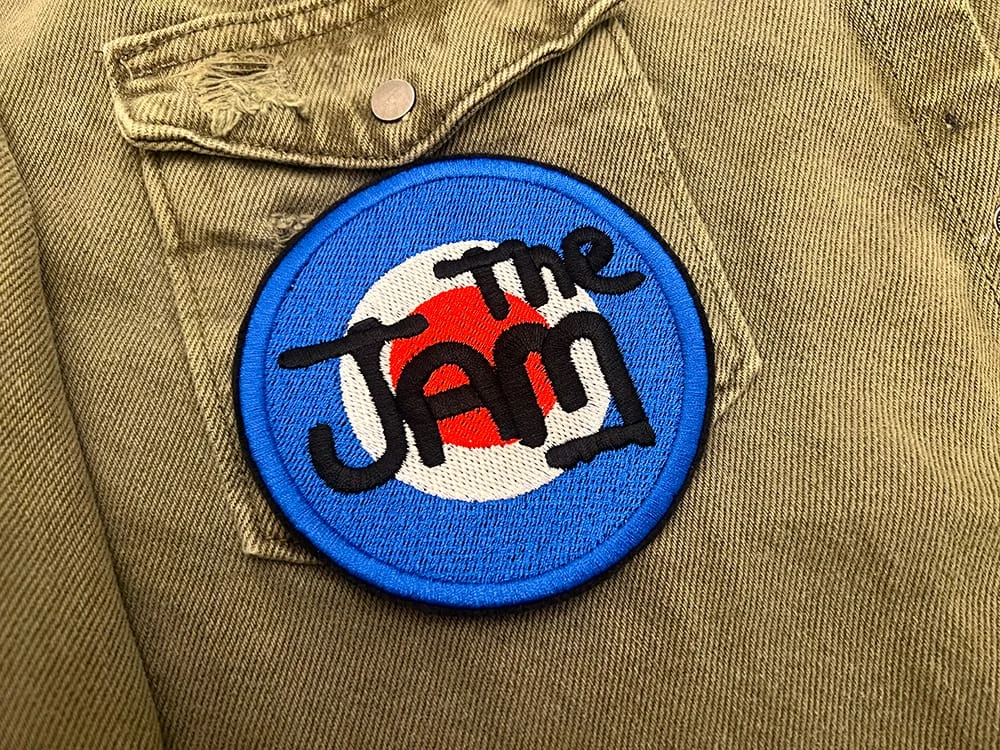 Embroidered rock patch border and stitching detail