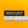 Premium embroidered Weezer Logo Patch 1 on denim jacket