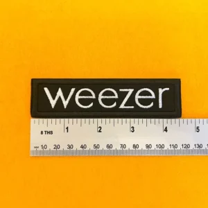 Premium embroidered Weezer Logo Patch 1 on denim jacket