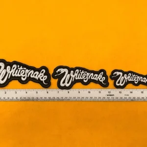 Premium embroidered Whitesnake band patch on denim jacket