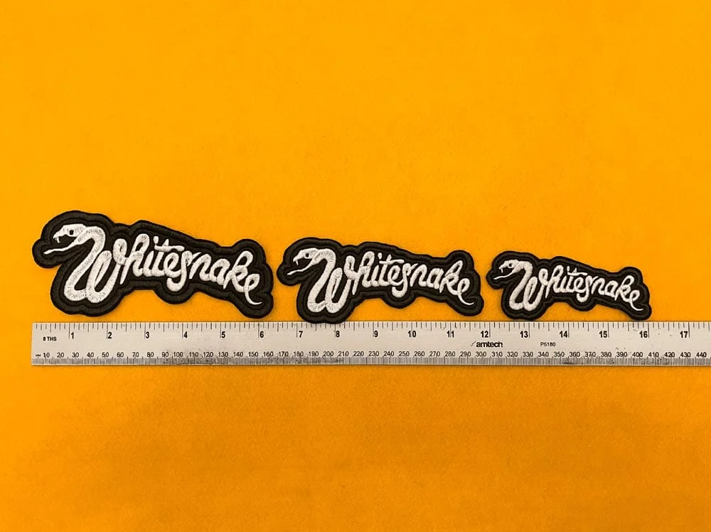 Premium embroidered Whitesnake band patch on denim jacket